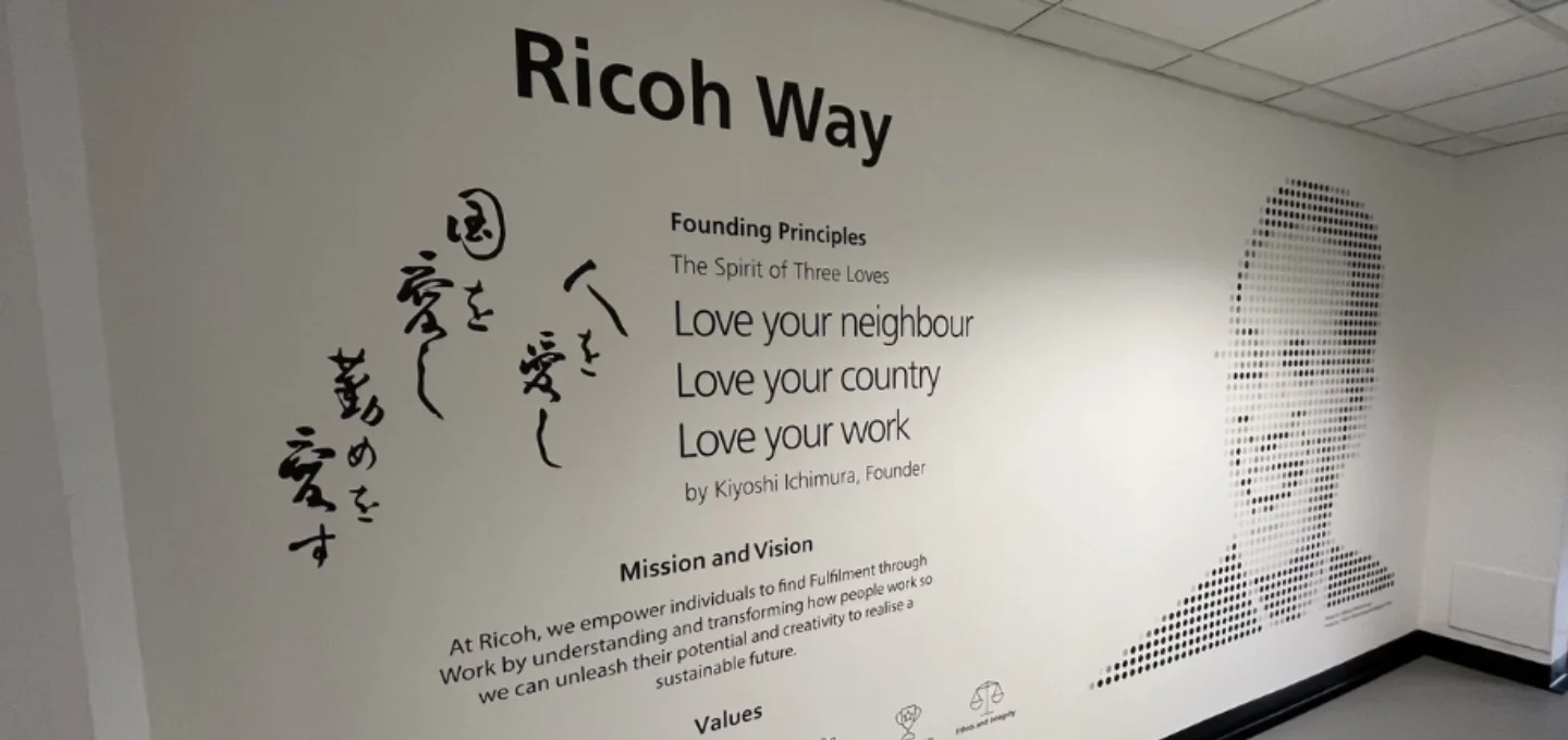 A 'Ricoh Way' wall, explaining Ricoh's Founding Principles, Mission-Vision, and Values.